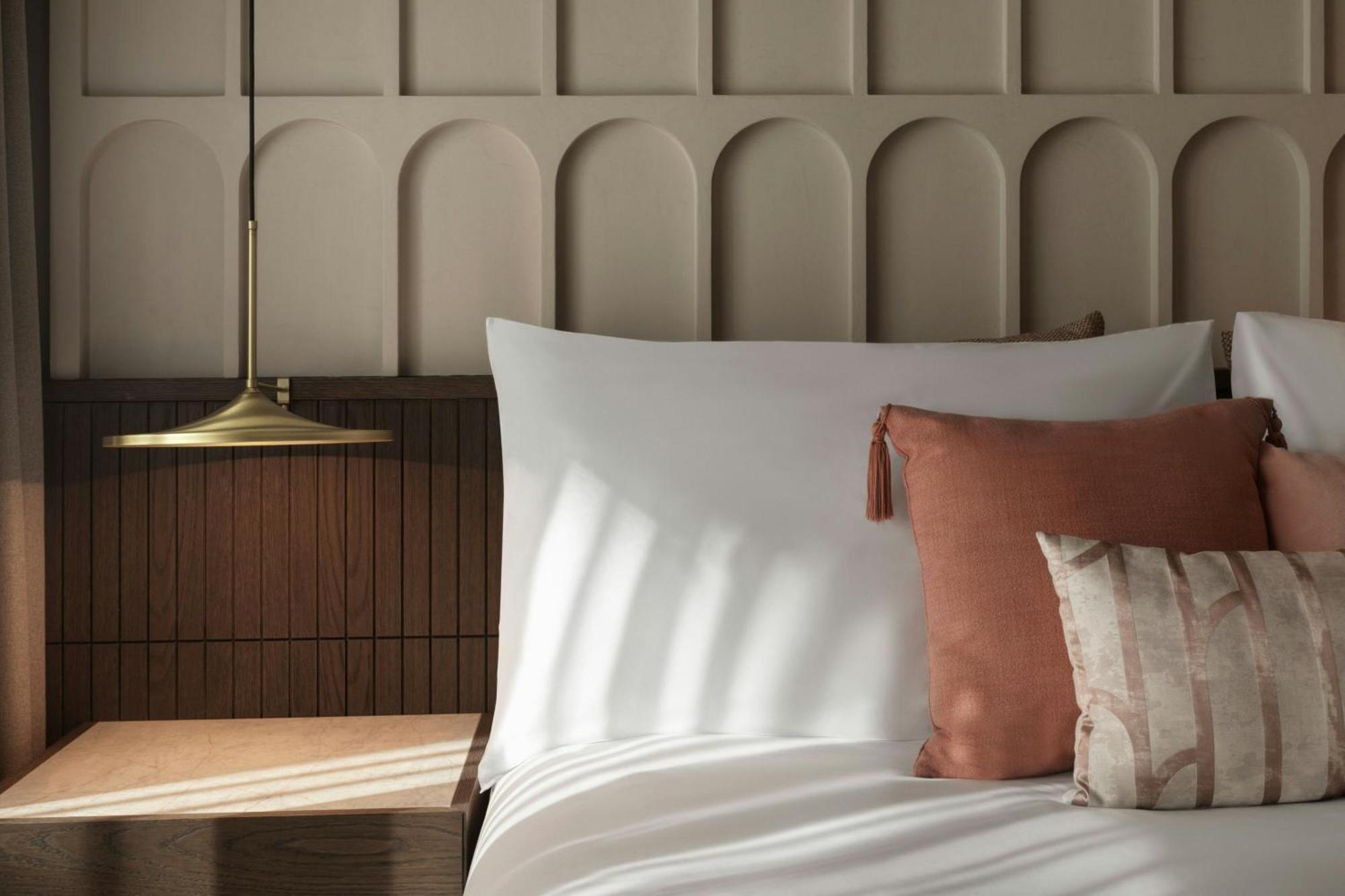 Monasty, Thessaloniki, Autograph Collection Hotel Exterior foto A bed with a nightstand