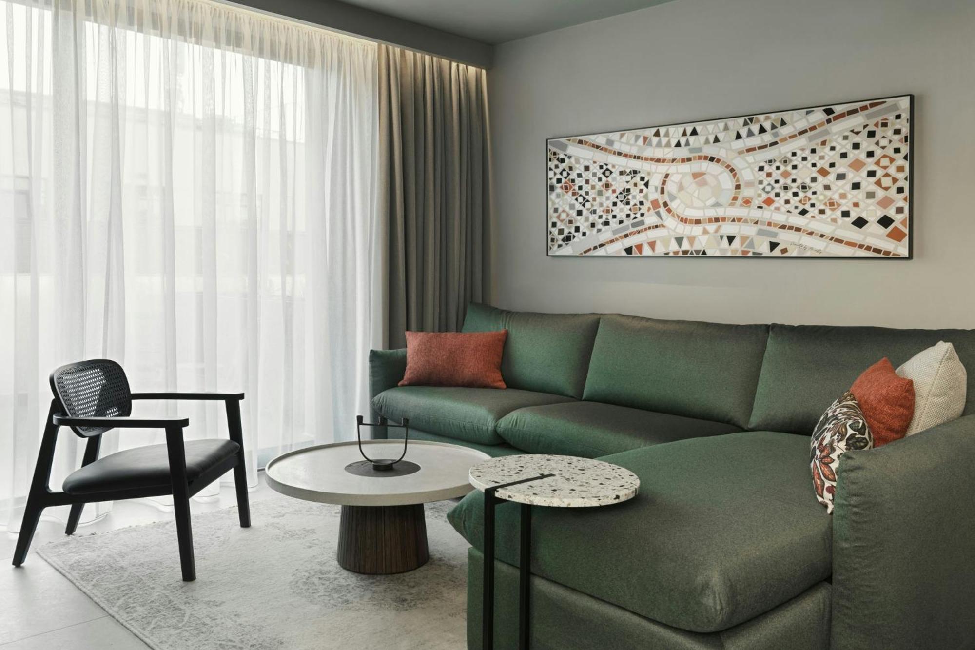 Monasty, Thessaloniki, Autograph Collection Hotel Exterior foto A living room